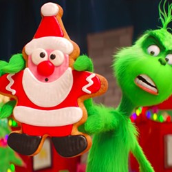 BITE ME, CHRISTMAS! The grumpy green cynic (voiced by Benedict Cumberbatch) returns to ruin Whoville's Christmas, in The Grinch. - PHOTO COURTESY OF UNIVERSAL PICTURES