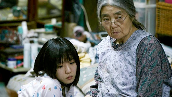 HEARTBREAKER A family of petty thieves helps a child (Miyu Sasaki, left) after finding her outside in the cold and exhibiting signs of abuse, in Shoplifters. - PHOTO COURTESY OF GAGA PICTURES