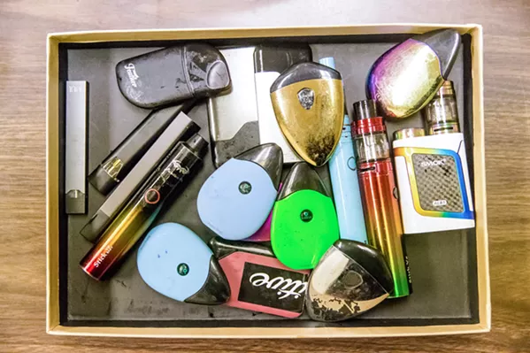 CONFISCATED Vape pens, pod mods, and other forms of electronic cigarettes are being taken from students on a regular basis at schools like SLO High, where nicotine use among teens is on the rise thanks to the proliferation of the devices. - PHOTO BY JAYSON MELLOM