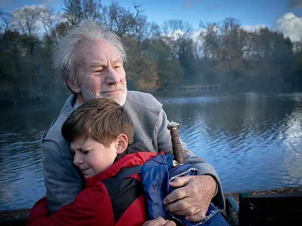 BE SOMEBODY Merlin (Sir Patrick Stewart) helps Alex (Louis Ashbourne Serkis) fulfill his destiny, in The Kid Who Would Be King. - PHOTO COURTESY OF BIG TALK PRODUCTIONS