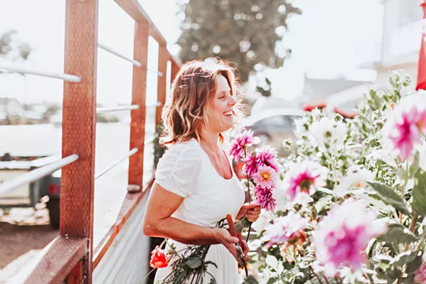GARDEN OF EDEN Rachael Manuele (pictured) turned her passion for nature into a career with the creation of her fine art floral design company, Eden Floral. - PHOTOS COURTESY OF ALEXANDRA WALLACE