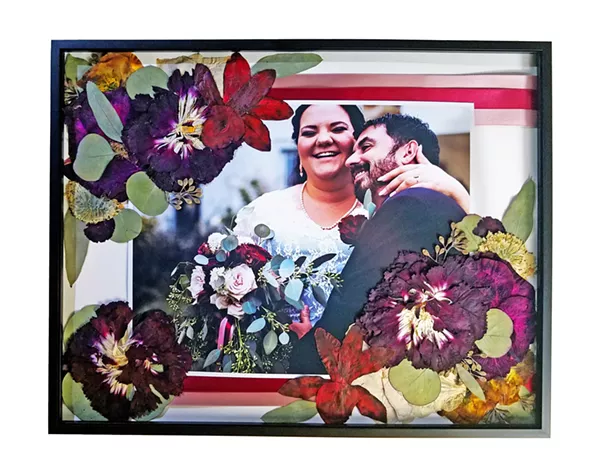 DELICATE BEAUTY Ecobata owner Sarah Presogna creates one of a kind artwork by combining beautifully pressed pieces from her clients wedding bouquet and other sentiments such as photos, vows, and song lyrics. Her work is available through Etsy. - PHOTOS COURTESY OF SARAH PRESOGNA