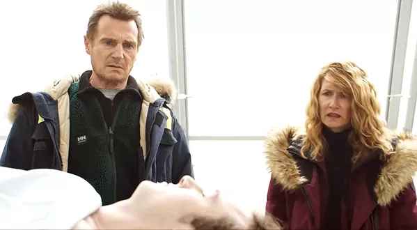 DEATH WILL FOLLOW Snowplow driver Nels Coxman (Liam Neeson, left) and his wife, Grace (Laura Dern), identify their drug-overdosed son, Kyle (Micháel Richardson). - PHOTO COURTESY OF PARADOX FILMS