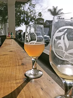REWARD After a round-trip walk of the Bob Jones Trail, Karen Garcia and I enjoy beers at Libertine Brewing Company's Avila Beach tasting room. - PHOTOS BY PETER JOHNSON
