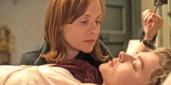 NOT WHAT SHE SEEMS Frances McCullen (Chloë Grace Moretz, right) finds a purse on the subway and returns it to Greta Hideg (Isabelle Huppert), who harbors ill intent for her new acquaintance, in Greta. - PHOTO COURTESY OF SIDNEY KIMMEL ENTERTAINMENT