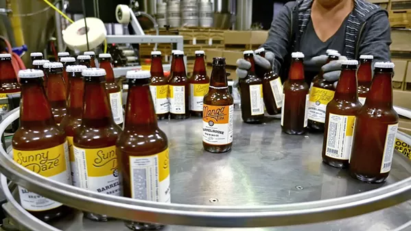 BOTTLED UP Tin City takes viewers behind the scenes of BarrelHouse Brewing Co. (below) and other Tin City businesses. - PHOTOS COURTESY OF DINA MANDE