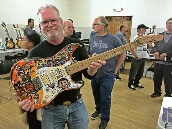 CUSTOM CLASSIC John Summers of SLO shows a guitar he custom painted. See more great guitars at the Central Coast Guitar Show on March 30 in the SLO Vets Hall. - PHOTO COURTESY OF THE CENTRAL COAST GUITAR SHOW