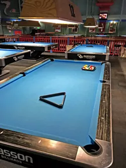 NOT-SO-HOT SHOT After going in the ocean, I walked over to one of my favorite pool halls, Hot Shots, to hone my mediocre pool game and watch March Madness—another spring favorite of mine. - PHOTOS BY PETER JOHNSON