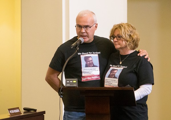 ELIMINATING DANGER In memory of their son, James and Becky Grant speak at the SLOCOG meeting on April 3, continuing their push for closure of the intersection where their son was fatally injured. - PHOTO BY JAYSON MELLOM