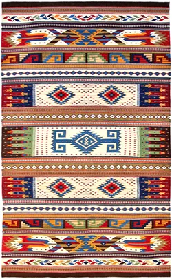 THE LINE Master Weaver Porfirio Gutiérrez takes inspiration from both his upbringing as part of the Zapotec culture in Oaxaca, Mexico, and his life in America in pieces like Door to the Spirit World. - IMAGES COURTESY OF PORFIRIO GUTIÉRREZ