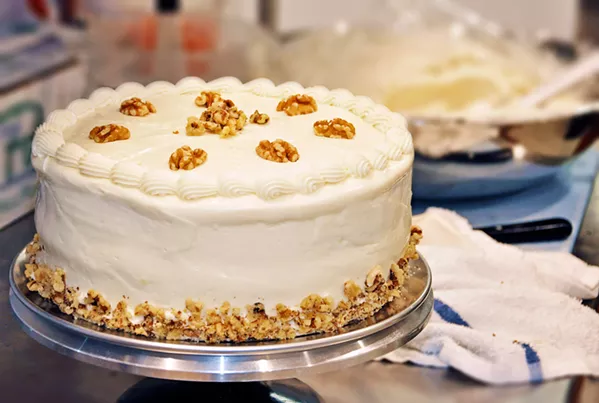 POPULAR CAKE This carrot cake is the top-selling dessert at Taco Temple, DeWolf says, and she's still trying to figure out how many she needs to have at the ready for eager customers. - PHOTOS BY CAMILLIA LANHAM