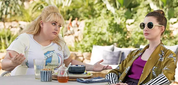 DESPERATELY UNFUNNY Mismatched female scam artists—low-rent Lonnie (Rebel Wilson, left) and classy Josephine (Anne Hathaway)—star in The Hustle, a lackluster remake of Dirty Rotten Scoundrels. - PHOTO COURTESY OF METRO-GOLDWYN-MAYER