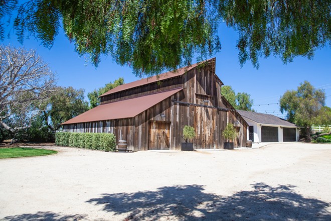 HITCH YOUR WAGON Want a barn for your wedding? A rustic setting? That old-fashioned yet modern vibe? Pretty grape vines as a backdrop? The Best Wedding Venue in the county, according to readers, is Greengate Ranch and Vineyard—and they’ve got all of that and more. - PHOTO BY JAYSON MELLOM