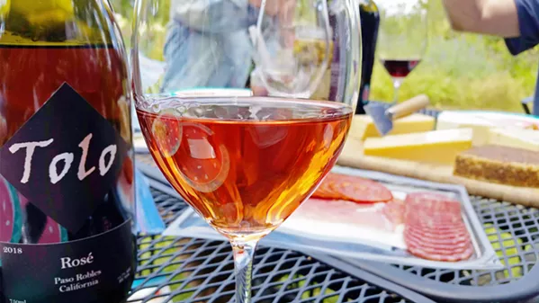CHEERS For this Memorial Day picnic, as we celebrated my mom and stepdad's 25th anniversary, we brought a DIY tapas spread. The array of Spanish meats and cheeses perfectly complemented Tolo's rosé. - PHOTOS BY ANDREA ROOKS