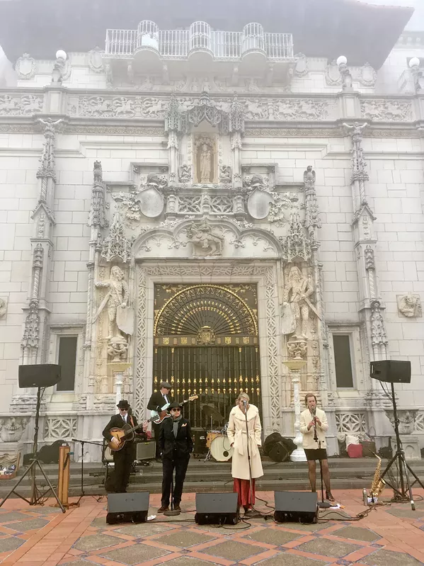 IN THE COLD The Tipsy Gypsies weathered the rain and fog with bluesy covers of songs by bands like Portishead. It's befitting of a late afternoon spent walking around a castle built in the 1920s. - PHOTOS BY CAMILLIA LANHAM