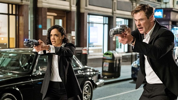 TEAM WORK New recruit Agent M (Tessa Thompson) and Agent H (Chris Hemsworth) join forces to find an enemy mole in their organization, Men in Black: International. - PHOTO COURTESY OF COLUMBIA PICTURES