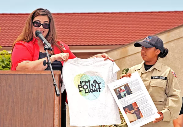 RECOGNIZED On June 11, Lesly Diaz (right), 17, a student at Grizzly Youth Academy, received the President's Gold Volunteer Service Award and National Daily Point of Light Award for her volunteer work helping animals in crisis. - PHOTO COURTESY OF JEFF BOWEN