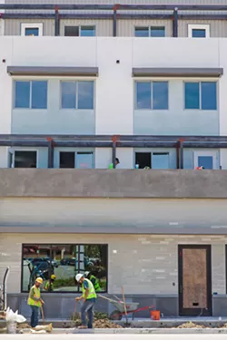 RENTED After a nearly yearlong vacancy that drew public criticism, four affordable apartments at 22 Chorro Street (pictured under construction) are now rented. - FILE PHOTO BY JAYSON MELLOM