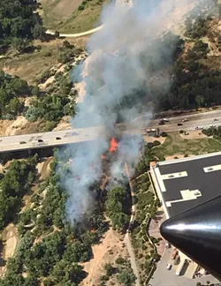 CHRONIC FIRES Brush fires in the Salinas Riverbed, like the one pictured from June 10, are a growing problem for the city of Paso Robles. - IMAGE COURTESY OF THE CITY OF PASO ROBLES