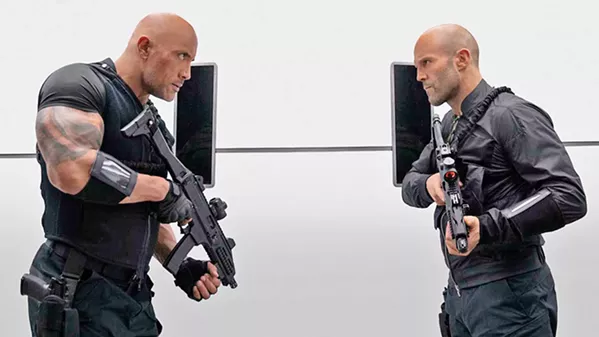 TEAM WORK Lawman Luke Hobbs (Dwayne Johnson, left) teams up with outcast Deckard Shaw (Jason Statham) to stop a genetically enhanced villain, in Fast & Furious Presents: Hobbs & Shaw. - PHOTO COURTESY OF UNIVERSAL PICTURES