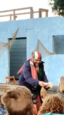 THANKS, MATEY! Before the Shakespeare Festival's Treasure Island begins, a swarthy pirate wanders the audience looking for loot. - PHOTOS BY ANDREA ROOKS