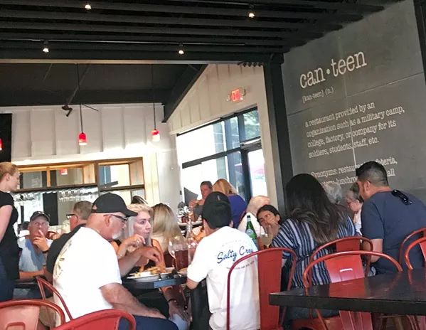 CASUAL TRATTORIA FEEL The Tin Canteen has become a place for locals and visitors alike. Families come in by the droves, and many don't even need to see the kids menu because the pizzas are for everyone! - PHOTOS BY BETH GIUFFRE