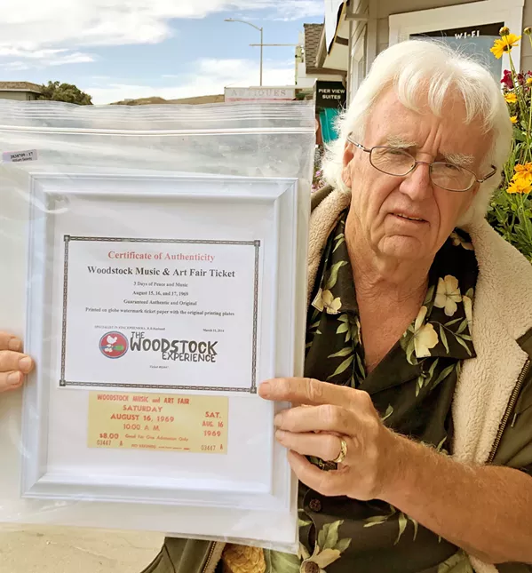 PRIZED MEMORABILIA Cambrian William Seavey's Woodstock collection includes an original paper ticket that he had framed. - PHOTO BY MALEA MARTIN