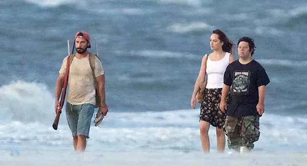 SENSE OF ADVENTURE Zak (Zack Gottsagen, right), a young man with Down syndrome, embarks on a Mark Twain-like odyssey, joined by small-time outlaw Tyler (Shia LeBeouf, left), and kind nursing home employee Eleanor (Dakota Johnson, center), in The Peanut Butter Falcon. - PHOTO COURTESY OF ARMORY FILMS