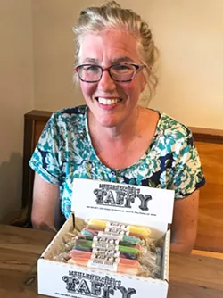 TAFFY LADY Alicia Himelson took over Mehlenbacher's Taffy business in 2007. She has been running the nationally known candy business out of a Paso Robles commercial kitchen with a couple of part-time employees for so long now that everyone knows her as the "Taffy Lady." - PHOTO BY BETH GIUFFRE