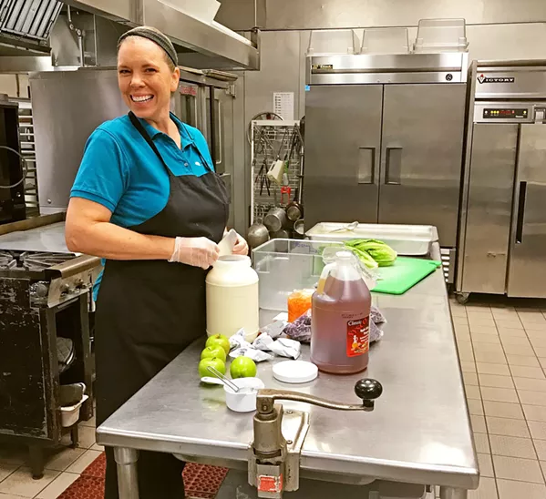 MEAL PREP Great care is taken in healthy meal planning for San Luis Coastal schools, and as a hub for 15 school sites, Laguna Middle School's kitchen is enormous, sparkling clean, and impressive. - PHOTO BY BETH GIUFFRE