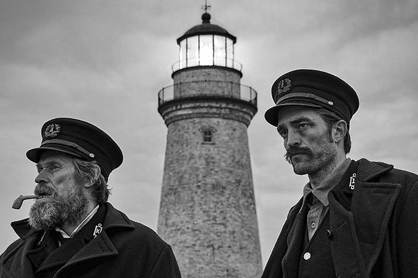MAD WORLD Two men&mdash;Thomas Wake (Willem Dafoe, left) and Ephraim Winslow (Robert Pattinson)&mdash;find themselves trapped on a remote island together in the hallucinatory black and white horror fantasy, The Lighthouse, screening exclusively at The Palm Theatre. - PHOTO COURTESY OF A24