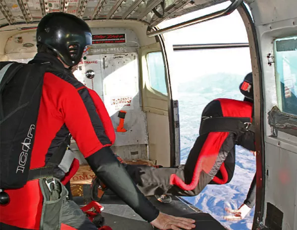 JUMPING FOR JOY A skydiver heads out the door of Skydive Santa Barbara's plane. - FILE PHOTO BY AMY ASMAN
