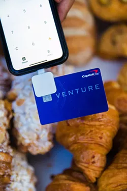 SWIPING ON THE GO Products like Square, an inexpensive and mobile card reader that plugs into smartphones and tablets, can be used anywhere with cell service. Such devices have revolutionized the business industry, making it possible for almost anyone to accept card payments without investing in much infrastructure. - PHOTO BY JAYSON MELLOM