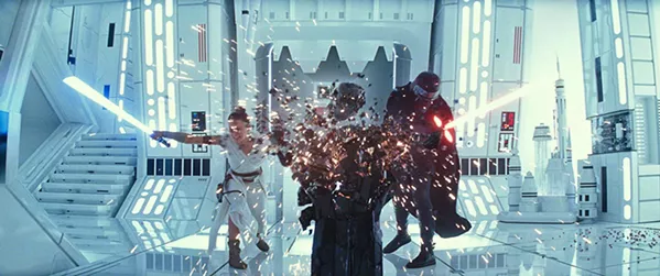 BATTLING THE DARK SIDE As the Resistance weakens, Rey (Daisy Ridley) battles the forces behind the Sith, including the troubled Kylo Ren (Adam Driver). - PHOTOS COURTESY OF LUCASFILM