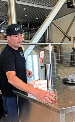 YEAR OF HYBRIDS AND SOURS Firestone Walker Brewing Company Head Brewer Dustin Kral pours Rosalie, a rosé/beer hybrid that led to one of the biggest drink trends in the nation. - FILE PHOTO BY BETH GIUFFRE