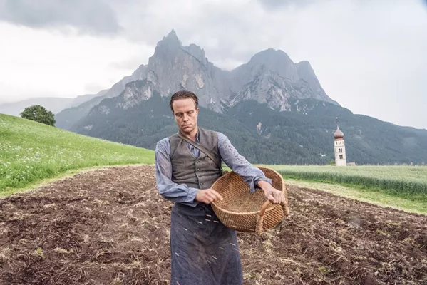FACING FASCISM August Diehl stars as Austrian farmer Franz Jägerstätter, a conscientious objector who faces execution for refusing to fight for the Nazis in World War II, in auteur Terrance Malick's A Hidden Life. - PHOTO COURTESY OF STUDIO BABELSBERG