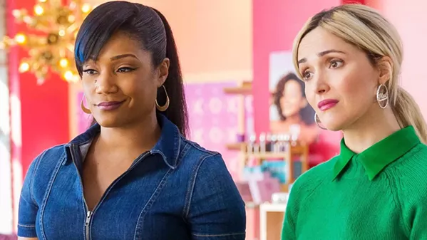 BEAUTY CONTEST Two friends—Mia Carter (Tiffany Haddish, left) and Mel Paige (Rose Byrne)—start Mel & Mia's, a cosmetics company, but they have very different ideas about how to run it, in Like a Boss. - PHOTO COURTESY OF PARAMOUNT PICTURES