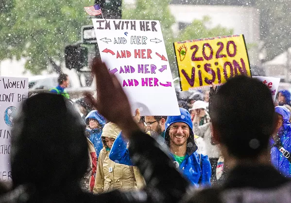 SUPPORTING WOMEN'S RIGHTS Participants of the 2017 Women's March SLO event held signs that read, "I'm with her." - FILE PHOTO BY JAYSON MELLOM