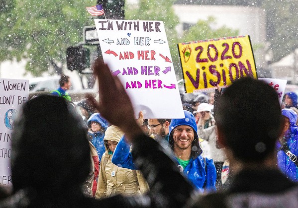 SUPPORTING WOMEN'S RIGHTS Participants of the 2017 Women's March SLO event held signs that read, "I'm with her." - FILE PHOTO BY JAYSON MELLOM