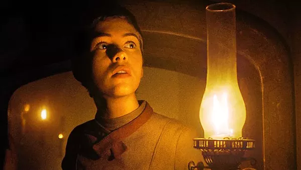 USELESS CHILD In this retelling of the classic Brothers Grimm tale, 16-year-old Gretel (Sophia Lillis) leads her little brother into the woods, where they're kidnapped by a cannibalistic witch, in Gretel and Hansel. - PHOTO COURTESY OF ORION PICTURES