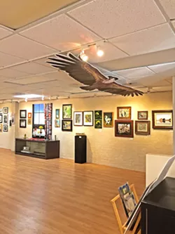 BIRDS EVERYWHERE From the walls to the ceiling, bird-themed art is in abundance at Art Center Morro Bay. - PHOTOS BY MALEA MARTIN