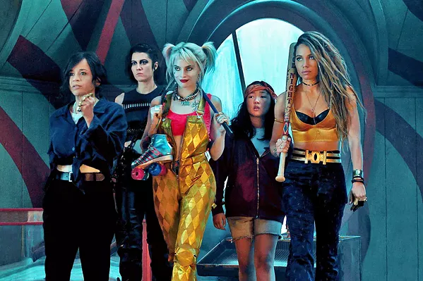 LADIES NIGHT (Left to right) Renee Montoya (Rosie Perez), Huntress (Mary Elizabeth Winstead), Harley Quinn (Margot Robbie), Cass (Ella Jay Basco), and Black Canary (Jurnee Smollett-Bell) square off against one of Gotham's arch-villains, in Birds of Prey. - PHOTO COURTESY OF DC ENTERTAINMENT