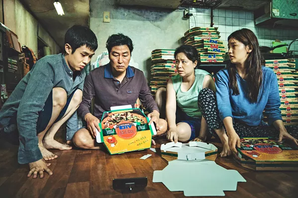 BEST PICTURE! The impoverished Kim family infiltrates a wealthy family, replacing their longtime employees, in the four-time Oscar winner Parasite. - PHOTO COURTESY OF BARUNSON E&A