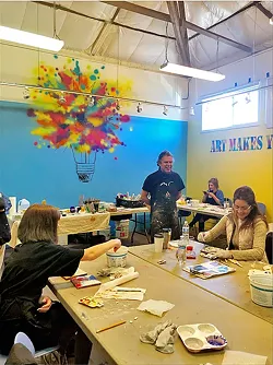 IN THE STUDIO Javier Manrique leads a group workshop at Studios on the Park on the art of fresco painting. - PHOTOS BY MALEA MARTIN