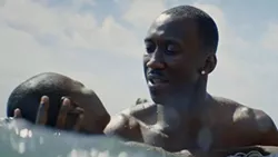 COMPLICATED CHARACTER Mahershala Ali won the 2017 Best Actor Oscar for his portrayal of Juan, a drug dealer who mentors a young gay boy while hooking the boy’s mother on drugs, in Moonlight, which also won Best Picture of the Year and is currently available on Netflix. - PHOTO COURTESY OF A24