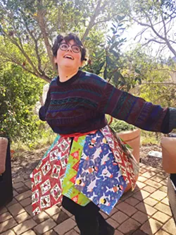 TRASHIONISTA! Cal Poly senior Elena "Laney" Richardson models her upcycled skirt made from used wrapping paper and ribbons from last Christmas. She's organizing an April 22 online Trashion Show. - PHOTOS COURTESY OF ELENA RICHARDSON