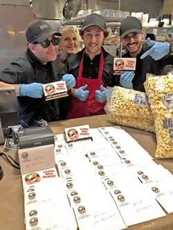 BUBBA'S GIVES THANKS Roger Sharp's crew at Big Bubba's Bad BBQ wants the Paso Police Department to come on over for dinner. Here they're preparing gift cards for the police department, in a community-wide effort to show local law enforcement some love. Bubba's is one of many local restaurants and wineries flooding the police stations with food and gift cards. - PHOTOS COURTESY OF ROGER SHARP
