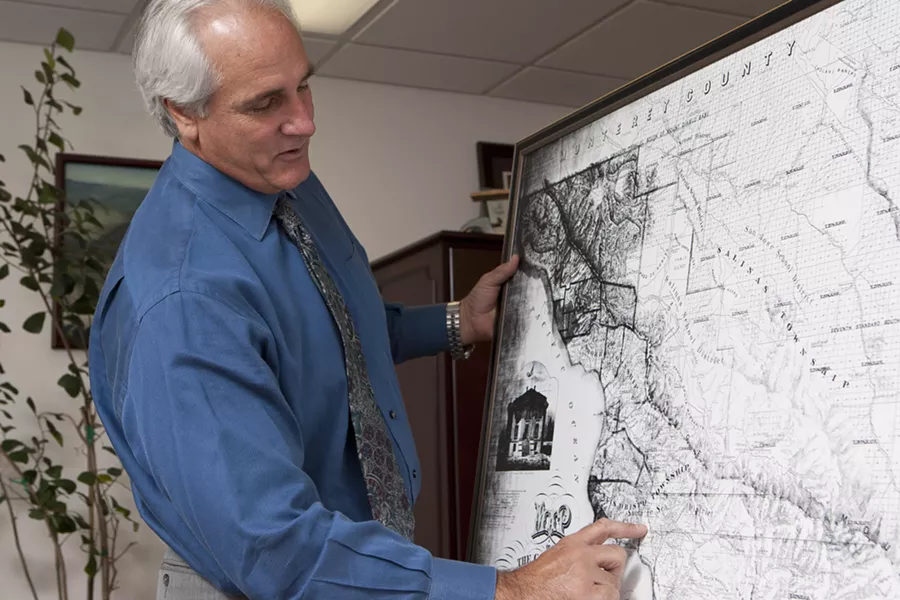 LAND MAN : Kevin Irot has worked in title insurance for 30 years but as he showed New Times, it’s difficult even for experts like him to track mineral rights. - PHOTO BY STEVE E. MILLER