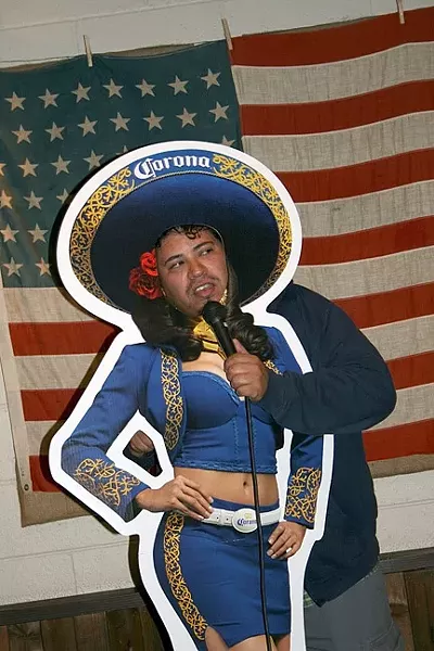 SIDE SPLITTING: Pete Munoz of San Jose makes a picture-perfect Corona Girl at Tent City Brewing Company Comedy Night’s two-year anniversary, which took place on Cinco de Mayo. - PHOTO BY HAYLEY THOMAS