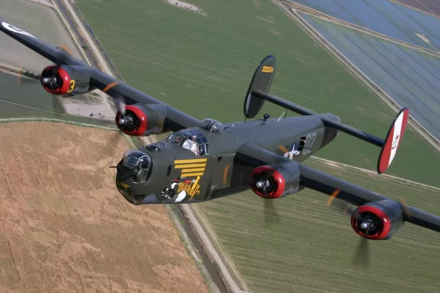 HEAVY BOMBER! : Witchcraft is the only operational B-24J , and a lucky few folks with a spare $425 can take a 30 minute flight in it or the B-17 (not pictured). - PHOTOS COURTESY OF THE COLLINGS FOUNDATION